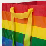 Sacola de compras colorida do arco-íris brilhante com alças amarelas resistentes, elegante e funcional.