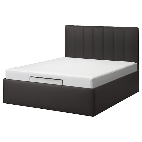 Cama preta moderna com cabeceira acolchoada e armazenamento embutido, design elegante.