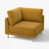 Poltrona de veludo cotelê amarelo UPPÅKRA com pernas cromadas.