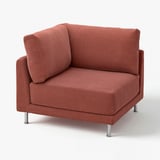 Uma poltrona UPPÅKRA laranja com tecido de veludo cotelê largo, pernas metálicas e design moderno e quadrado.