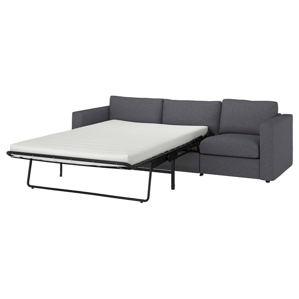 Sofá-cama VIMLE cinza, moderno, de três lugares com colchão grosso, estrutura de metal elegante.