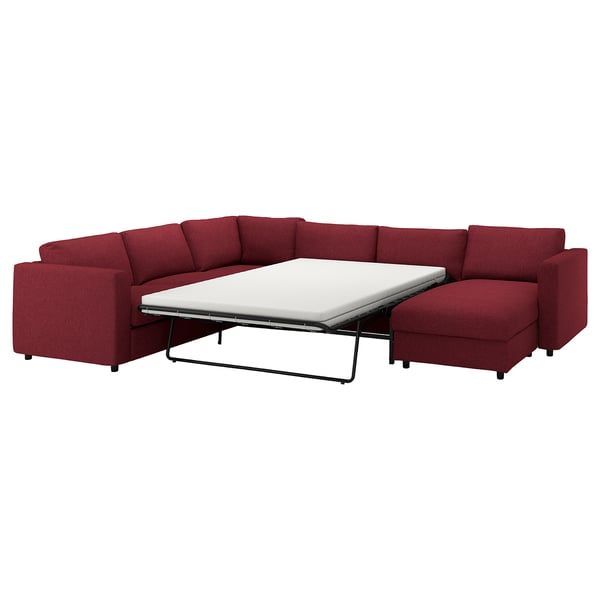 Sofá secional conversível vermelho com chaise, design moderno, adequado para pequenos espaços, fácil de transformar em cama.