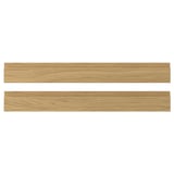 Dois painéis de madeira retangulares castanhos claros com superfícies lisas.