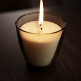 LINDLÖNNSKOG Scented candle in glass, Vanilla/grey, 50 hr