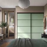 SKYTTA / BOAXEL Reach-in wardrobe with sliding door, black metal/Mehamn light green, 202x65x205 cm