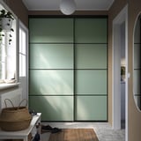 SKYTTA / BOAXEL Reach-in wardrobe with sliding door, black metal/Mehamn light green, 177x65x240 cm