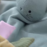 GULDVÄVARE Comfort blanket with soft toy, blue yellow/cat