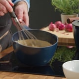 KLIPPFISK Saucepan with lid, non-stick coating glass/wood black-blue, 2.3 l