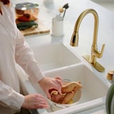 MACKSJÖN Pull down kitchen faucet with spray, brass color