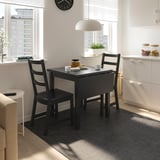 NORDVIKEN طاولة مع جناح ينطوي, أسود, ‎74/104x74 سم‏