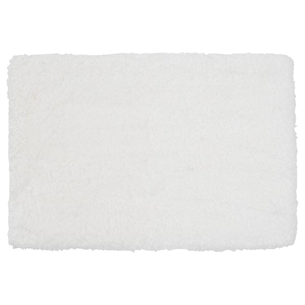 A white ALMTJÄRN bath mat, rectangular, with a soft microfibre top, and a latex backing for grip.