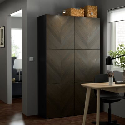 Large BESTÅ storage unit with dark chevron pattern, top baskets for storage.
