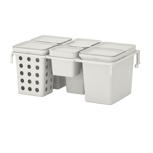 HÅLLBAR, a white waste sorting system with four bins and lids. It has a metal support frame, perfect for kitchen waste management.