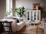 IDANÄS Cabinet with bi-folded glass doors, white, 121x50x135 cm
