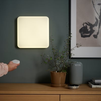 Smart light panel, white, square, sleek design, control colours and brightness.