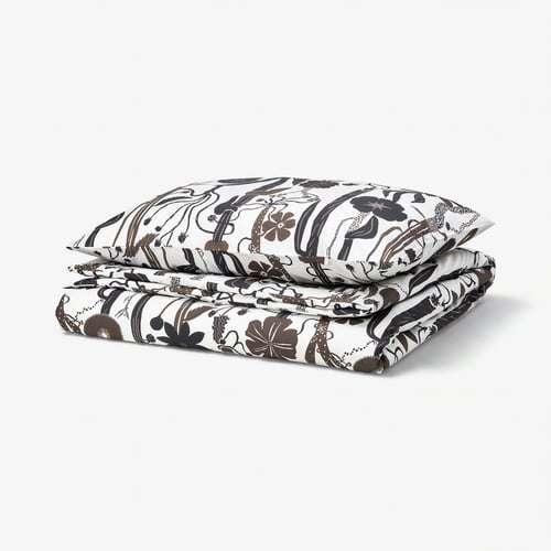 Folded LUNDSKAFTING duvet set, white with wild brown botanical patterns, rectangular shape.