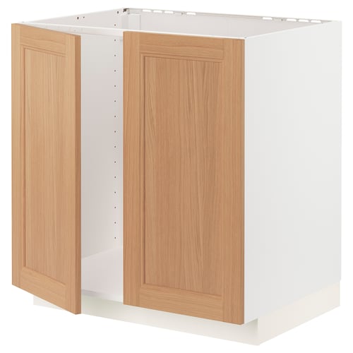 Ikea METOD white base cabinet with wooden doors.