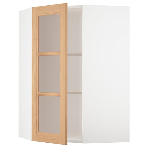 An open white corner cabinet with a wooden door, featuring glass shelves.