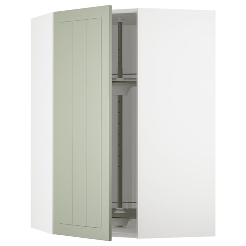 An open off-white METOD kitchen cabinet with green stensund doors and adjustable shelves.
