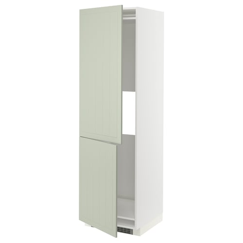 An open, tall, white METOD kitchen cabinet with green stensund doors. It has two adjustable shelves inside.