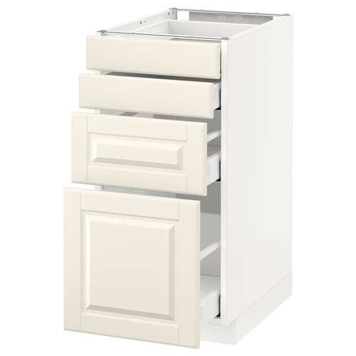 White METOD kitchen cabinet with three drawers and door, off-white fronts, bevelled edges.