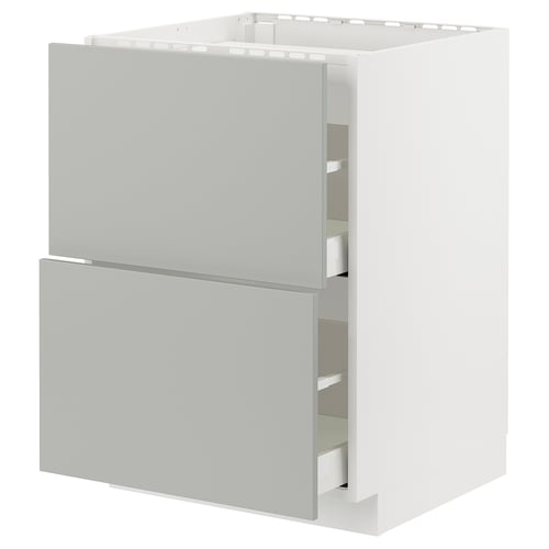 White METOD kitchen cabinet in light grey havstorp, with two open drawers.