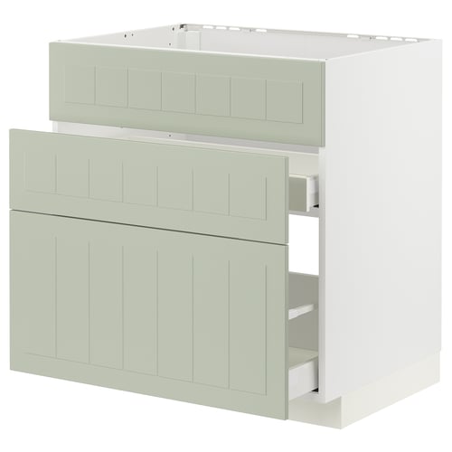 A green ikea METOD kitchen cabinet with three drawers and a cupboard on top.