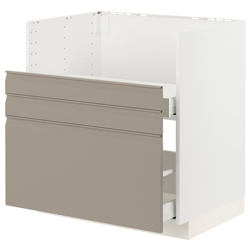 METOD kitchen unit with beige-brown drawers, three shelves, metallic handles.