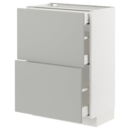 White METOD kitchen unit in light grey with open drawers, modern design.