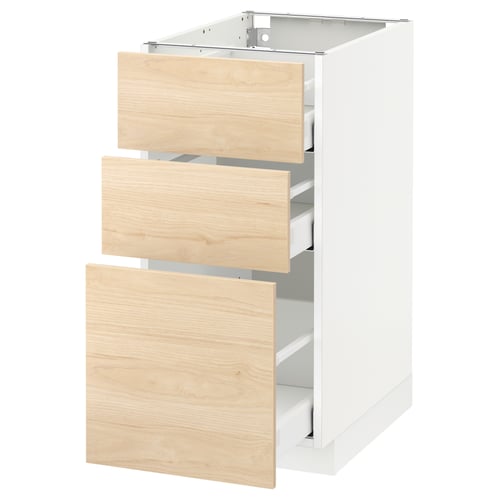 White ikea METOD kitchen cabinet with light ash wood drawers.