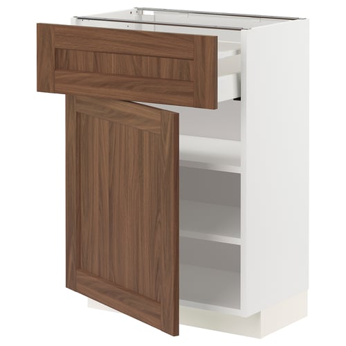 Open white kitchen cabinet with wooden drawers.