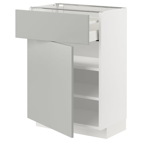 Modern white kitchen unit with light grey drawer, sleek design.
