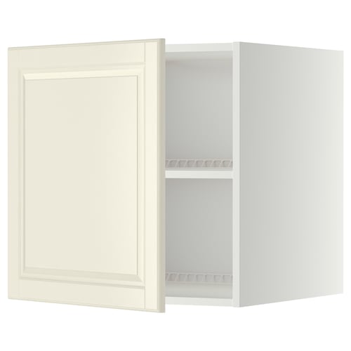 This image shows a white METOD kitchen cabinet with a single door open, revealing an adjustable shelf inside.