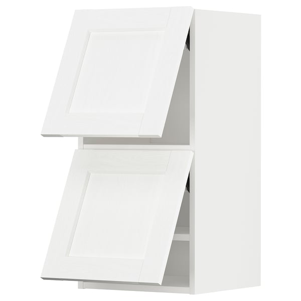 Ikea METOD kitchen cabinet in white. Two square doors with grooved edges. Sleek, modern design with sturdy frame.