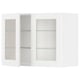 White METOD kitchen cabinet with glass doors and shelves.