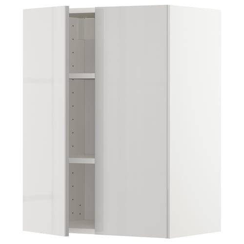 White METOD kitchen cabinet with high gloss grey shelves.