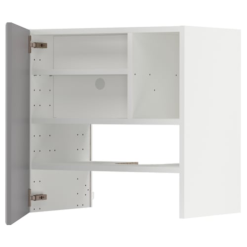 Open white METOD cabinet with adjustable shelves.