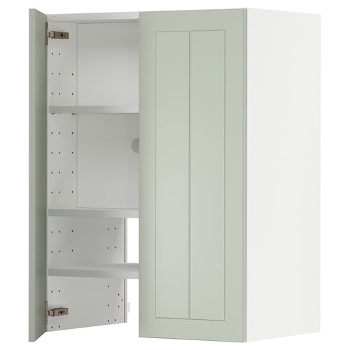 A METOD kitchen cabinet with a green stensund door, featuring adjustable shelves and a modern design.