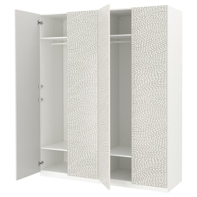 White PAX wardrobe with textured doors, soft close hinges, and adjustable shelves.