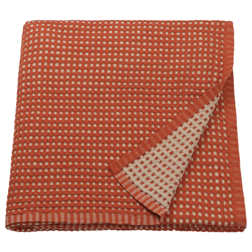 Bright orange chequered blanket, reversible, 100% cotton, folded square.