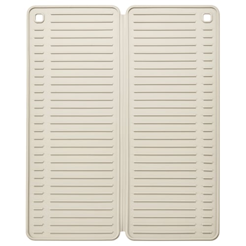 Two beige silicone mats with horizontal grooves placed side by side.