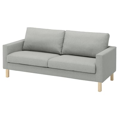 Light grey SALTSJÖBADEN sofa, sleek design, light wood legs, recycled polyester fabric.