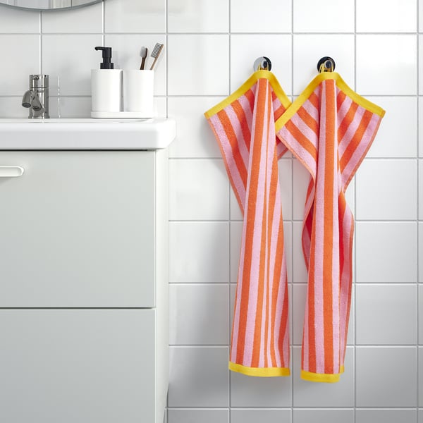 SLÅNHÖSTMAL Hand towel, orange/pink striped, 40x70 cm