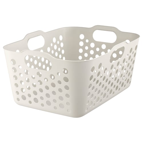A white SLIBB laundry basket. Its rectangular, made of plastic, with perforated sides and four handles for easy carrying.