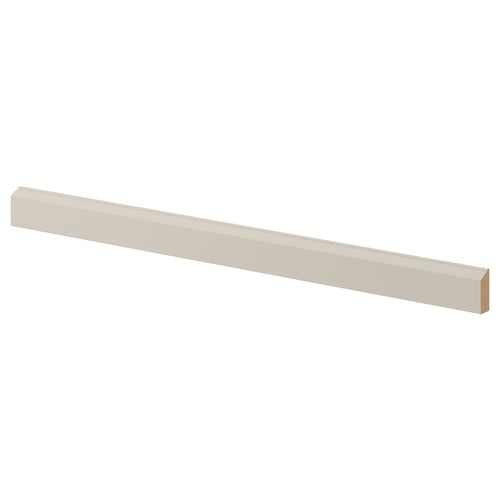 White STENSUND cord hider for kitchen decor.