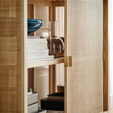 STOCKHOLM 2025 Cabinet with sliding doors, rattan/pine, 125x47x110 cm