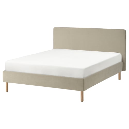 TÄRNKULLEN bed, beige, upholstered with wooden legs, rectangular shape, soft headboard.