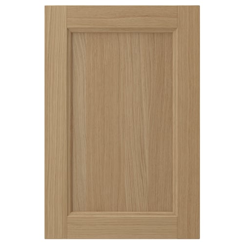 VEDHAMN natural oak cabinet door, solid oak frame, veneer panel, rectangular shape, simple design, warm wood tone.