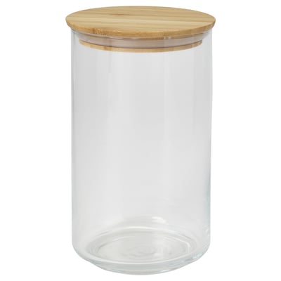 Un borcan de depozitare din sticlă transparentă cu capac de bambus. Este simplu și ideal pentru depozitarea alimentelor.