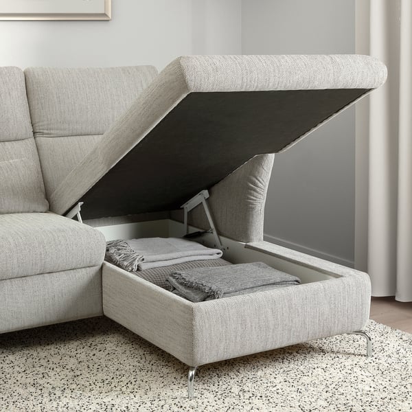 Canapea gri cu otoman de depozitare, pături în interior, țesătură texturată, picioare cromate.
